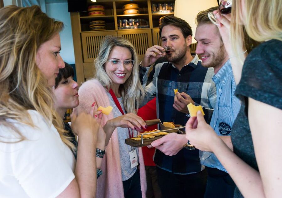 Amsterdam: Guided Cultural Food Tour in German or English - Magna Plaza and the canal belt