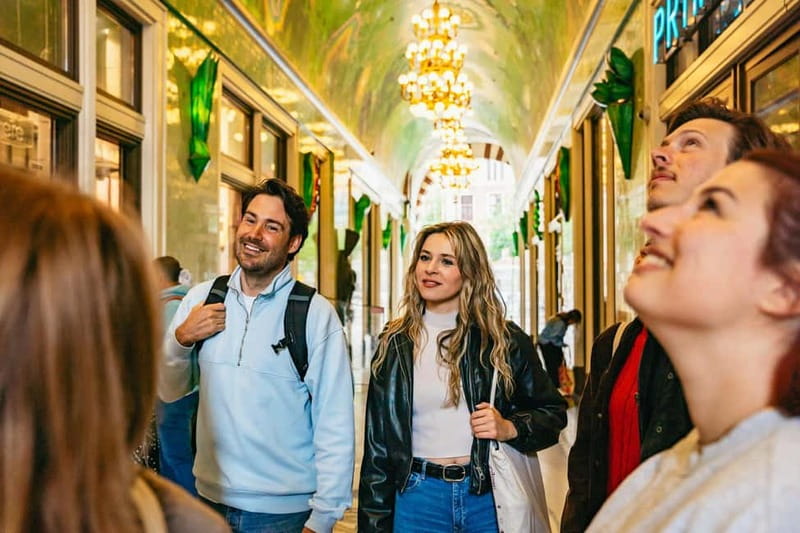 Amsterdam: Guided Cultural Walking Tour - Returning beside the Amstel