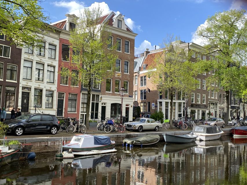 Amsterdam: Guided Off-The-Beaten-Track Walking Tour - From Magna Plaza to the Torensluis