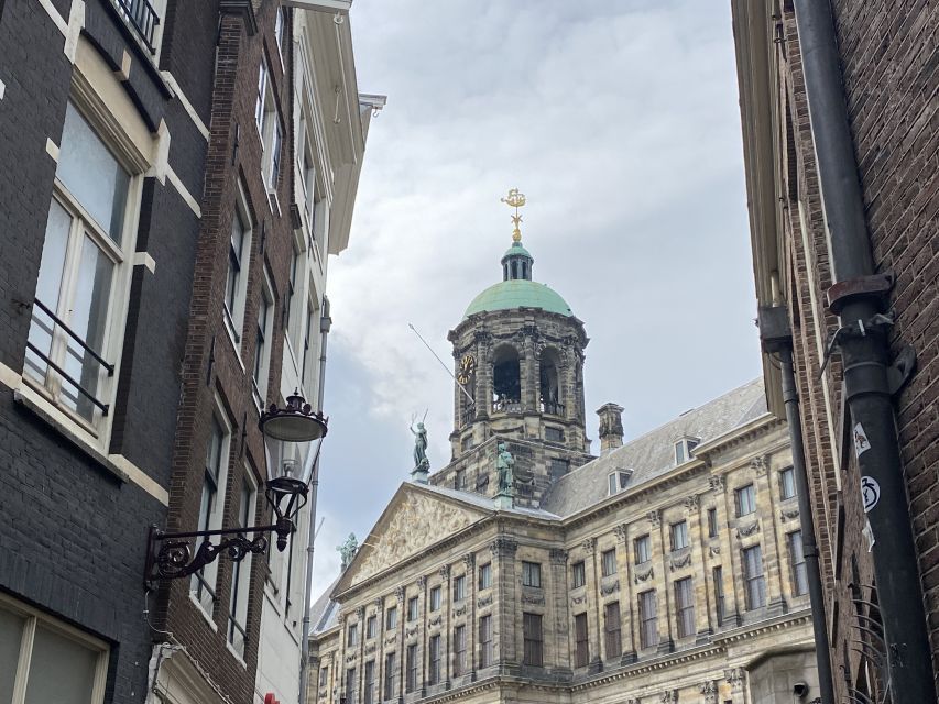 Amsterdam: Guided Off-The-Beaten-Track Walking Tour - Noordermaarkt, herring, and local flavor