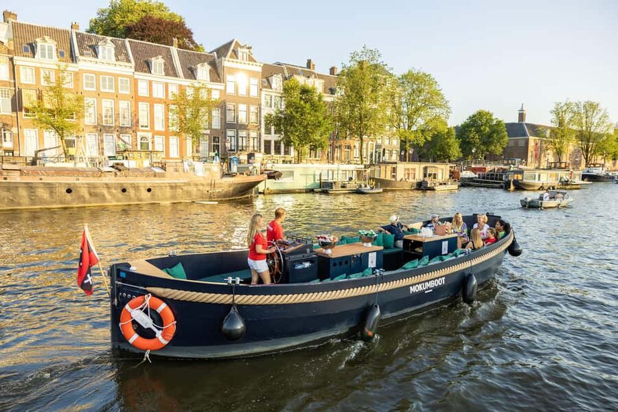 Amsterdam: Guided Open Boat Canal Cruise Including Drink - Key points to know before you book