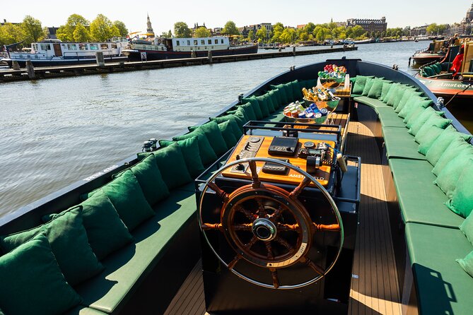 Amsterdam: Guided Open Boat Canal Cruise Unlimited Drinks Option - Key points to know before you book