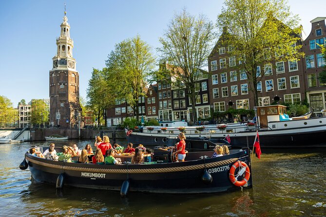 Amsterdam: Guided Open Boat Canal Cruise Unlimited Drinks Option - Why an open boat is a smart first look at Amsterdam