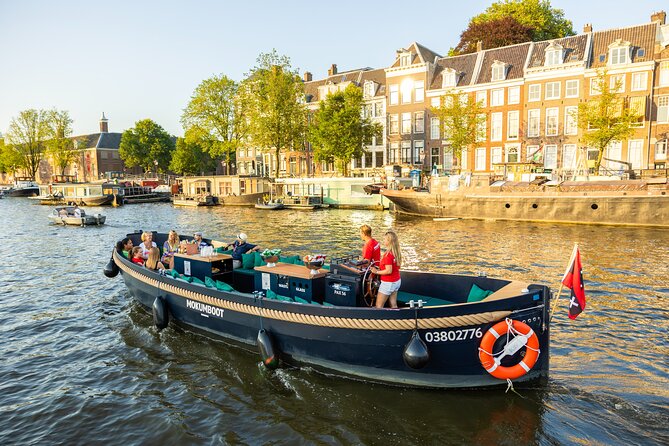 Amsterdam: Guided Open Boat Canal Cruise Unlimited Drinks Option - Jewish Amsterdam, Rembrandt, and the Waterlooplein area