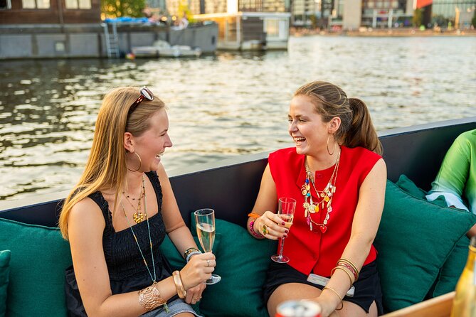 Amsterdam: Guided Open Boat Canal Cruise Unlimited Drinks Option - The Amstel, H’ART Museum, and the Skinny Bridge
