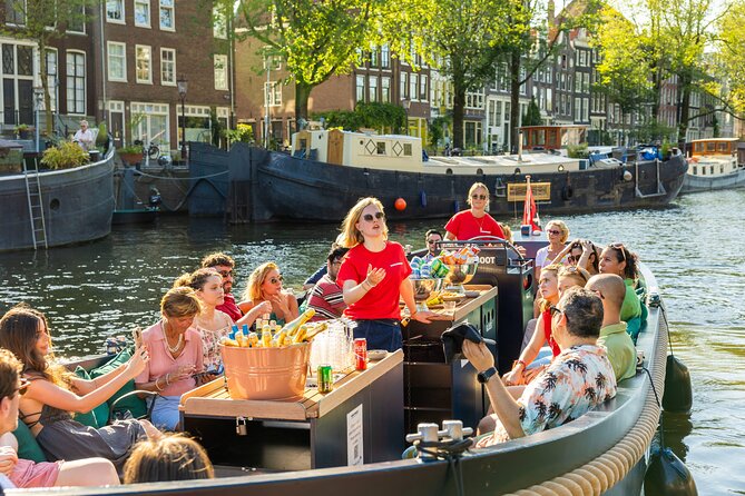 Amsterdam: Guided Open Boat Canal Cruise Unlimited Drinks Option - NEMO and Amsterdam’s maritime story