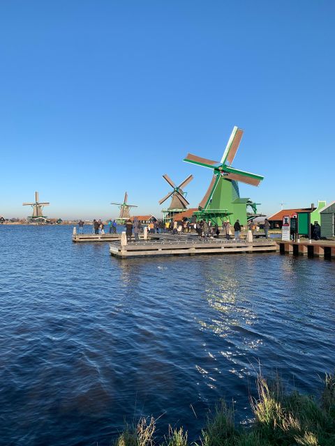Amsterdam: Guided Zaanse Schans, Windmills & Cheese Tour - What the coach and guide add
