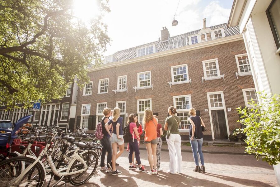 Amsterdam: Hidden Gems & Highlights Guided Bike Tour - Starting with Jordaan’s quiet lanes