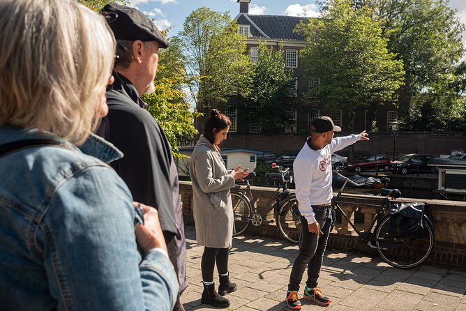 Amsterdam Highlights and History Walking Tour (MUST DO) - Begijnhof: a quiet courtyard with a different side of the city