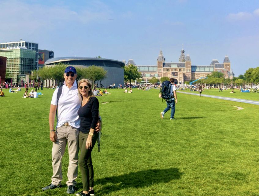 Amsterdam: Highlights & Hidden Gems Private Walking Tour - The Bloemenmarkt and the canal-side walk