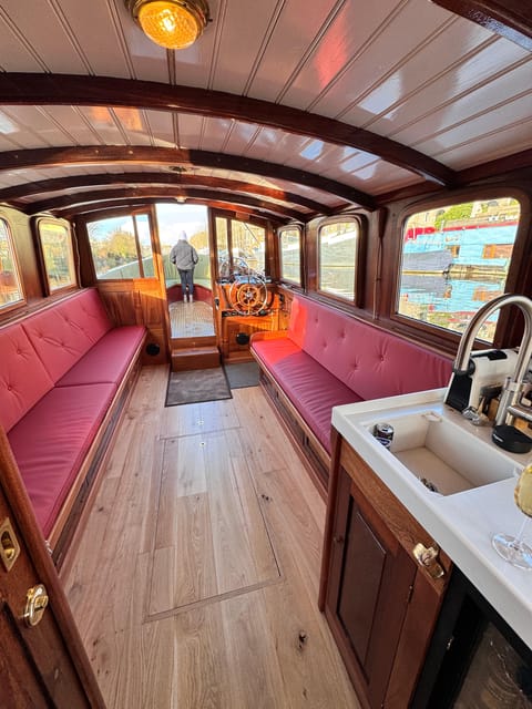 Amsterdam: Historic Boat Cruise with open bar and nibbles - Practical value at $69 per person