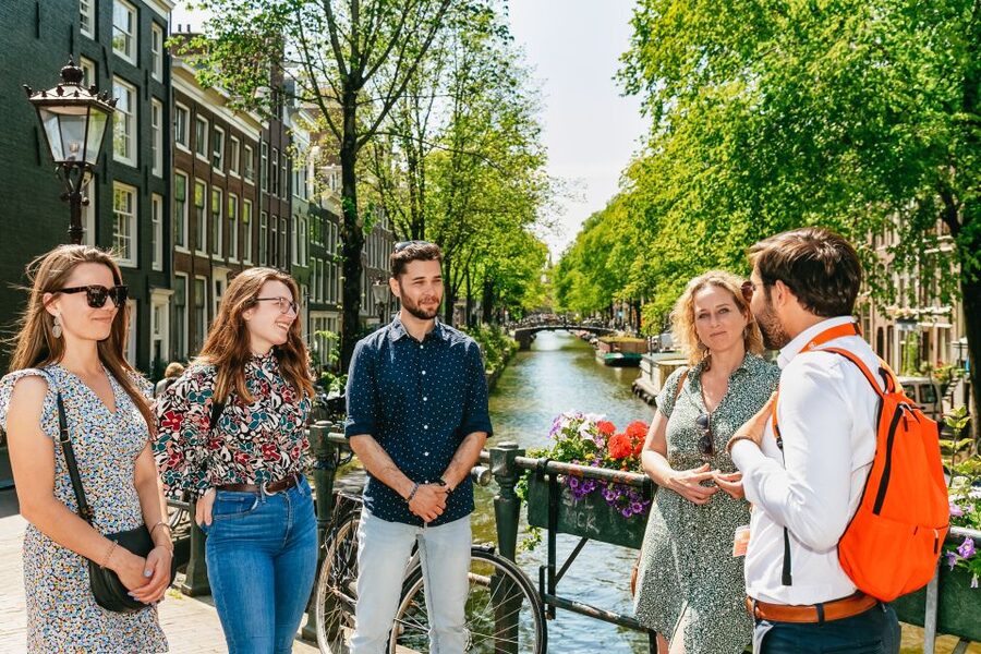 Amsterdam: Historical Highlights Walking Tour with Tasting - The canals, bridges, and locks of the old center