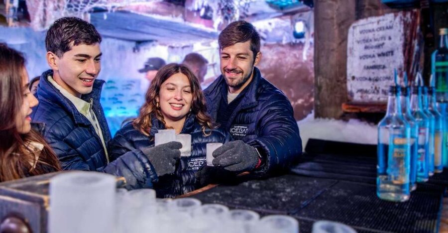 Amsterdam: Icebar Entry Ticket with 3 Drinks - Putting on the supplied winter gear