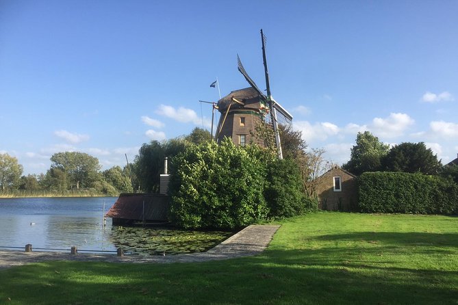 Amsterdam Landscape Windmill Private Bike Tour - Muiden’s brown cafe and fresh milk stop