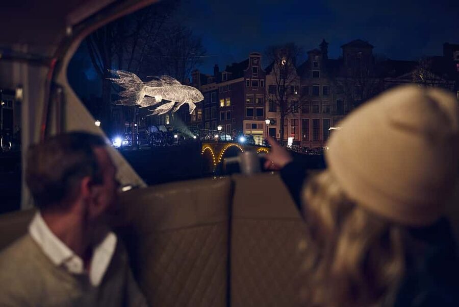 Amsterdam: Light Festival Boat with Unlimited Drinks Option - Haarlemmersluis and the view toward Centraal