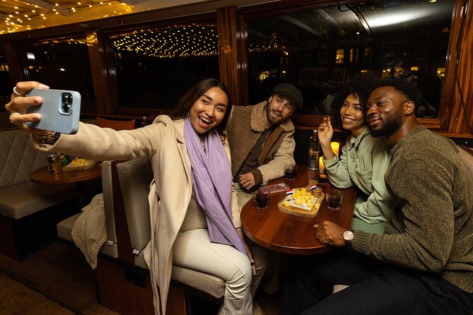 Amsterdam Light Festival: Heated Cruise with Hot Drinks & Bite - Seeing Amsterdam’s Light Festival from the canal