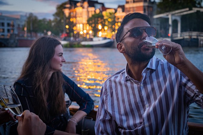Amsterdam Light Festival Private Cruise With Welcome Drink - Around Artis Zoo, the city becomes quieter