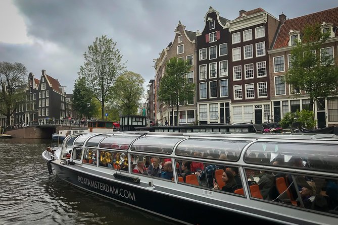Amsterdam Live Guided Sightseeing Canal Cruise - Anne Frank House and the canal-side landmarks