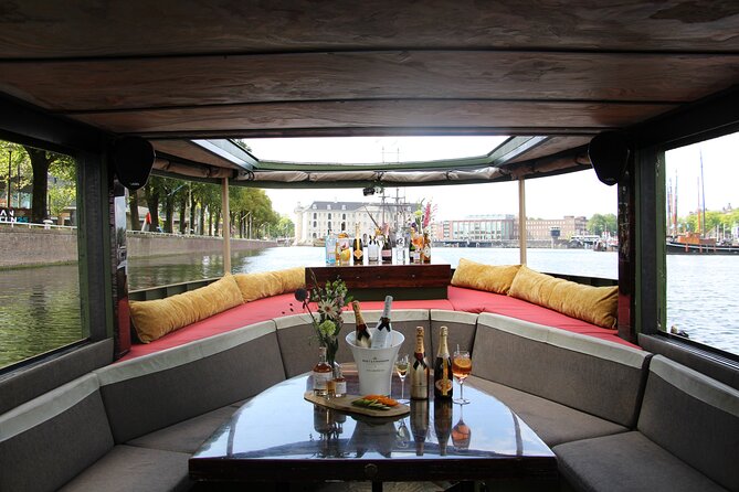 Amsterdam: Luxury Boat Cruise Unlimited Cocktails, Beers & Wines - Meeting point, booking, and cancellation details