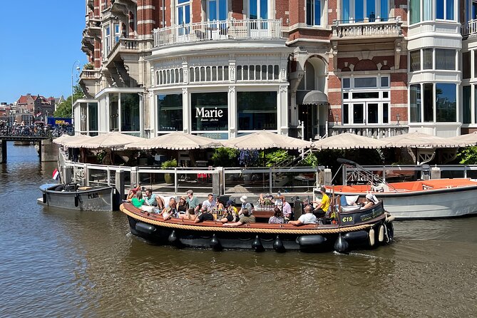 Amsterdam Luxury Boutique Boat tour with Unlimited Beer and Wine - Passing Rembrandt’s former home