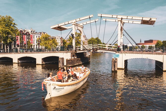 Amsterdam Luxury Canal Cruise + Unlimited Drinks & Bites option - Open summer boats and colder-weather compromises