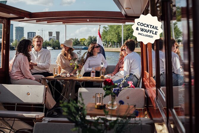 Amsterdam: Luxury Saloon Boat Cruise with Cocktails & Waffle - Why Amsterdam looks better from a low boat