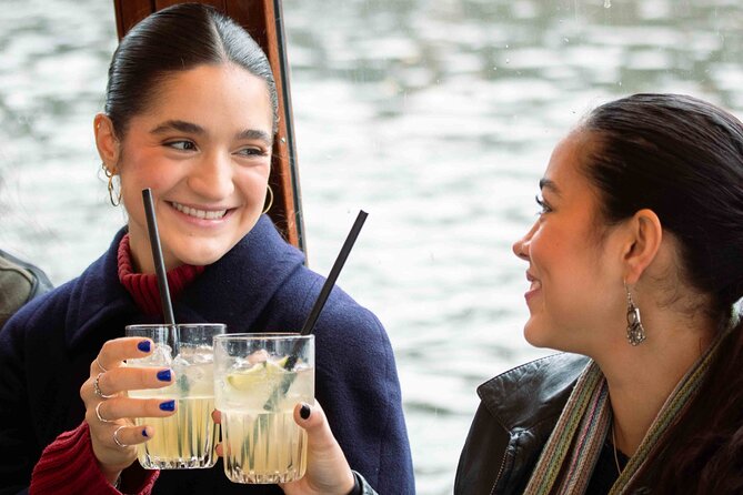 Amsterdam: Luxury Saloon Boat Cruise with Cocktails & Waffle - The Maritime Museum and NEMO from the water