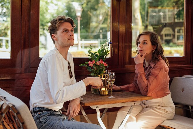 Amsterdam: Luxury Saloon Boat Cruise with Cocktails & Waffle - What the captain and host add