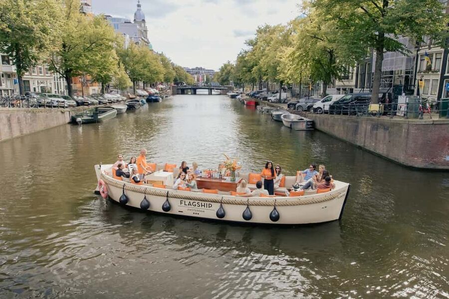 Amsterdam: Open Boat Cruise option Unlimited Drinks & Bite - Open-air views and changing weather