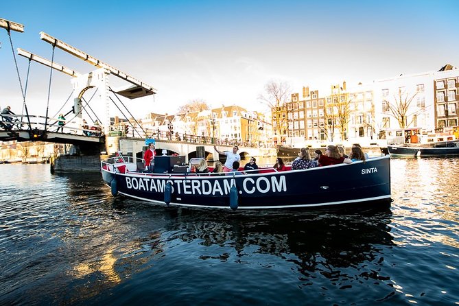 Amsterdam Open Boat Cruise with Live Guide and Two Drinks - The old center, Rokin, and darker stories