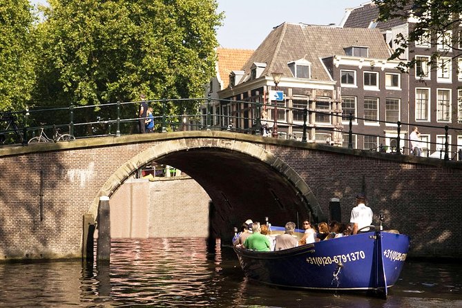 Amsterdam Open Boat Sightseeing Canal Cruise - Amsterdam Centraal and Pierre Cuypers’ design