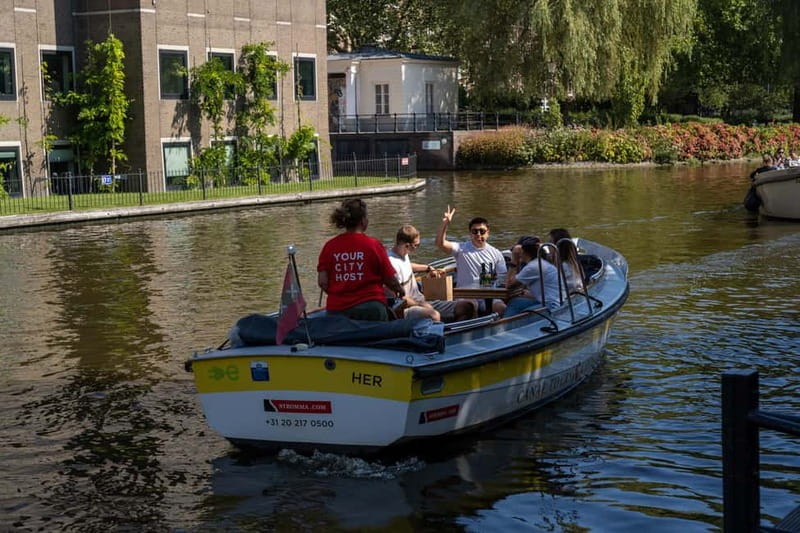 Amsterdam: Open Boat Tour of Canals with Expert Local Guide - Viewing the Rijksmuseum from the water