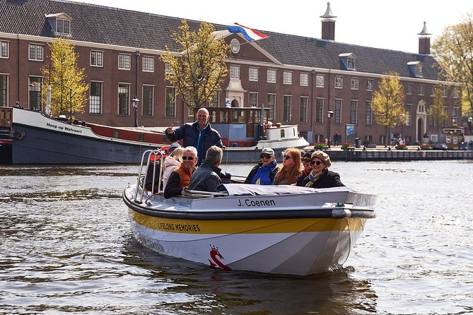 Amsterdam Open Boat Tour with Local Guide - The opening stretch: settling onto Amsterdam’s canals