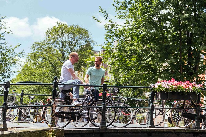 Amsterdam PRIVATE Bike Tour With Locals: Bike & Local Snack Included - Westerkerk and the canals of central Amsterdam