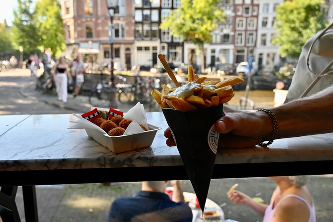 Amsterdam Private Food & Drinks Tour by UNESCO Canals & Jordaan - Singel, Nine Streets, and Dutch fries