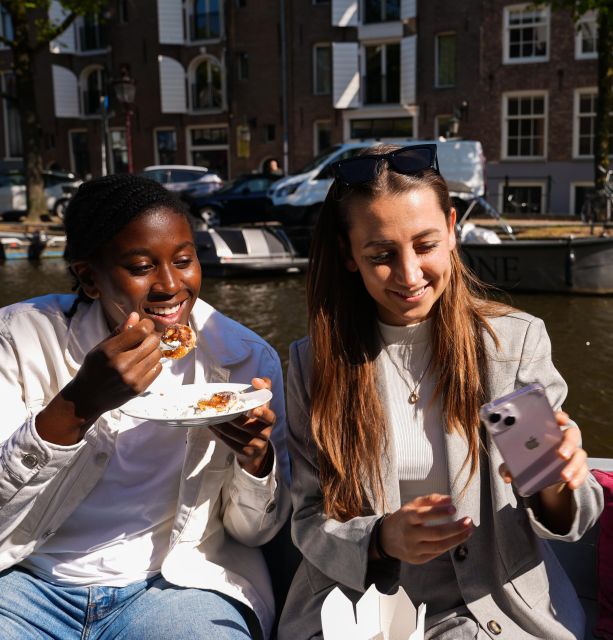 Amsterdam: Private Luxury Cruise with BBQ and Drinks - A private table on Amsterdam’s canals