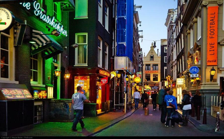 Amsterdam: Private Red Light District and Food Tour - Dam Square and the city’s first layers