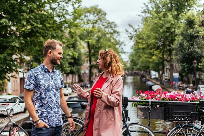 Amsterdam Private Tour: Highlights & Hidden Gems by Bike or Foot - Flower Market, old restaurants, and Dutch snacks