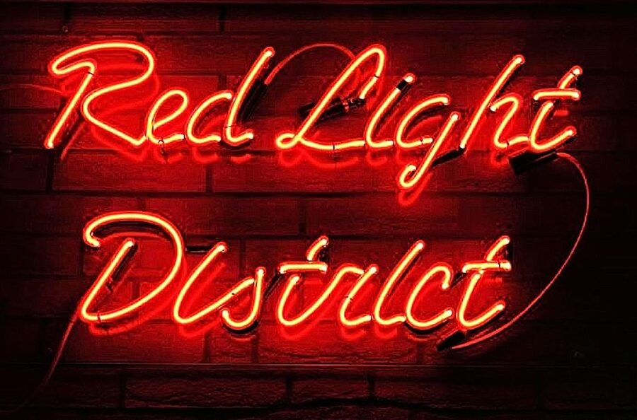 Amsterdam: Red Light District Exclusive Night Tour - Coffeeshops, smart shops, and Amsterdam’s liberal reputation