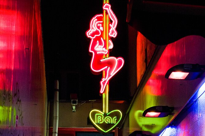 Amsterdam Red Light District Walking Tour in EN/DE/IT/ES - From the Condomerie to the area’s working rules
