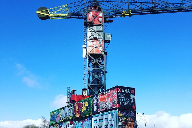 Amsterdam's Hidden Gems and Street Art Bike Tour - The Eye filmtheater and the ride beside Central Station