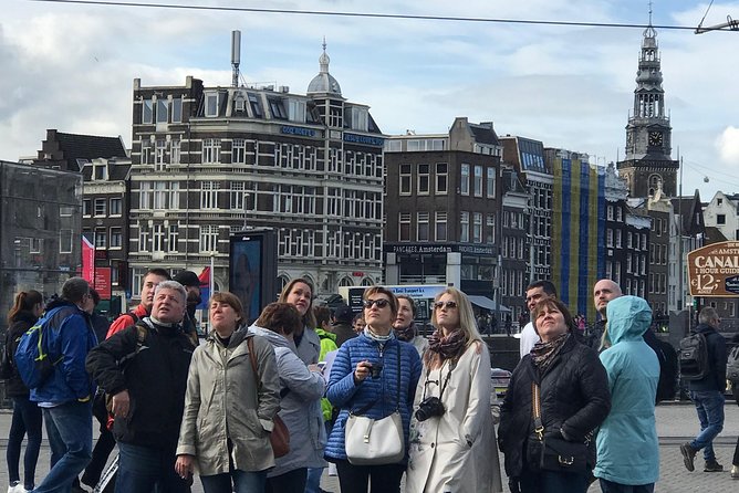 Amsterdam Sightseeing Tour + Hidden Gems + Tastings + PDF guide - Tuschinski cinema and Amsterdam’s decorative side
