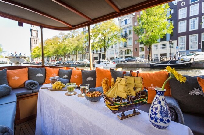 Amsterdam Small-Group Bike Tour With Canal Cruise, Drinks, Cheese - Reaching the canal cruise and what to expect on board