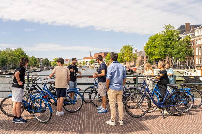 Amsterdam Small-Group Bike Tour With Canal Cruise, Drinks, Cheese - Riding conditions, weather, and group pace
