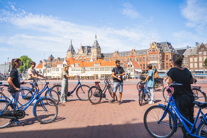 Amsterdam Small-Group Bike Tour With Canal Cruise, Drinks, Cheese - ARTIS, the narrow bridge, and Amsterdam’s compact center