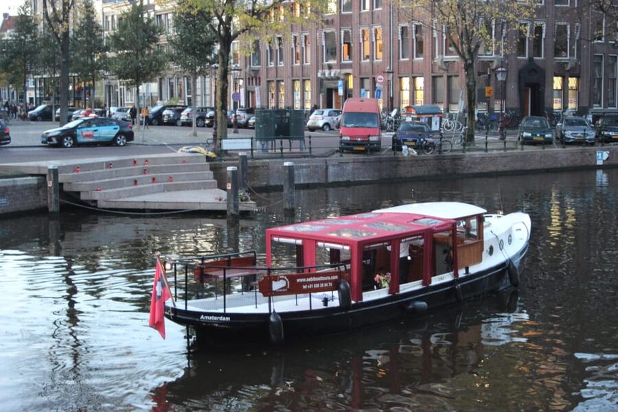 Amsterdam: Small-Group Canal Cruise incl. Drinks and Snacks - Boarding beside the Westerkerk