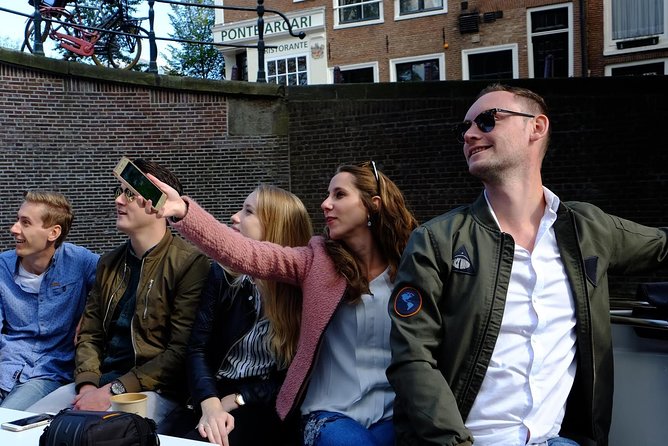Amsterdam Small-Group Canal Cruise Including Snacks and Drinks - Why a small boat changes the Amsterdam canal ride