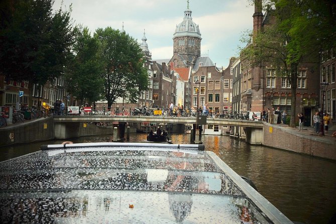 Amsterdam Small-Group Canal Cruise Including Snacks and Drinks - From the Amstel to the Red Light District