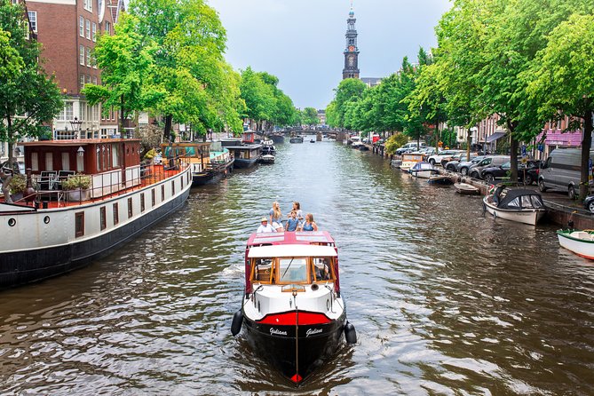 Amsterdam Small-Group Canal Cruise With Dutch Snacks and Drink - The old center, flea market, and red light district