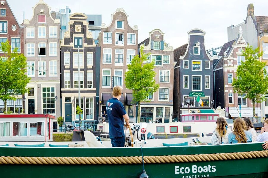 Amsterdam: The Newest Canal Cruise with Drink Option - Open water, rain, blankets, and drinks